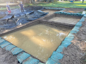 Flooding at the clay borrow pit excavations. Inundation of the archaeological resources is becoming a more frequent problem and is detrimental to the historic features, artifacts, and human remains.