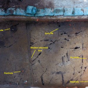 Aerial view of postholes and electrical line in excavation unit