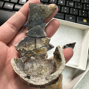 A crucible in August 2024, prior to the crucible reference collection project. Just the base and a few other pieces are mended.
