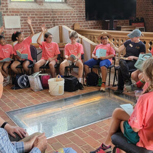 Staff Archaeologist Natalie Reid leads a question and answer session at the conclusion of the first session of Kids Camp.