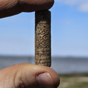 A pipe stem, possibly Dutch, found in the excavations southwest of the Archaearium.