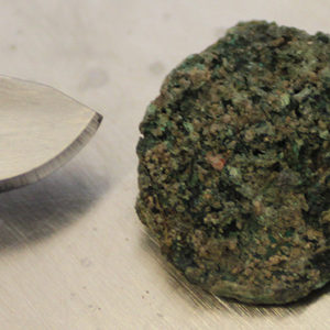 Corroded coin