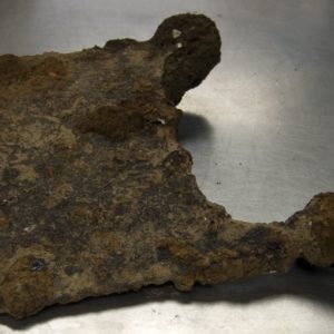 Corroded spade nosing on a metal lab table