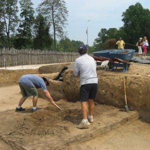 Archaeologists excavating a cellar