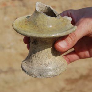 Base fragment of an earthenware candlestick