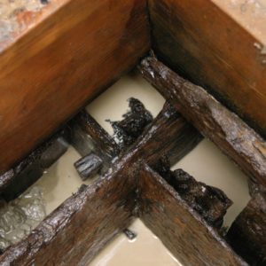 Connected wooden pieces in a tray