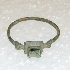 Copper alloy ring with missing stone