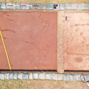 Conduit for fiber optic cables installed in 2019 (yellow) runs through the upper layers of the possible brick cellar excavations.