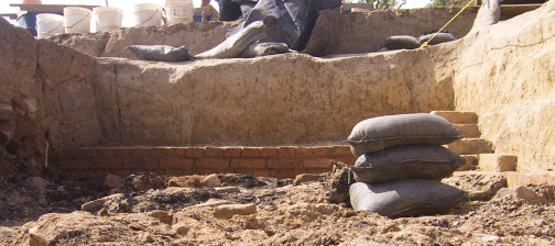 Sandbag and excavated brick wall of excavated cellar