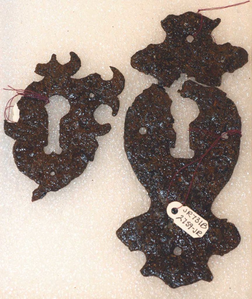 two iron escutcheons