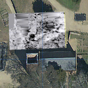 aerial view of a church and yard with overlaid ground penetrating radar survey results