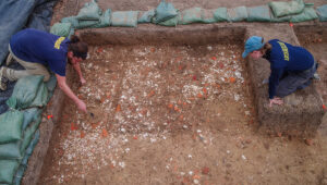 Archaeological Field Technician Josh Barber and Staff Archaeologist Natalie Reid at work at the brick and mortar rubble pile