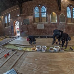 Church interior with in-progress floor renovation