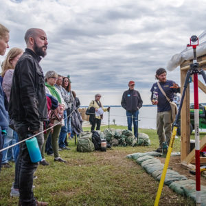 Archaeologist Josh Barber explains the excavations of the 1607 burial ground during a tour.