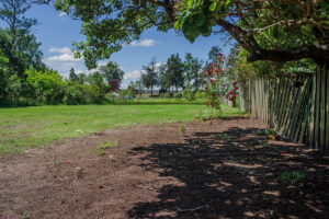 String marks out the location of an imminent excavation area just east of the Godspeed Cottage.