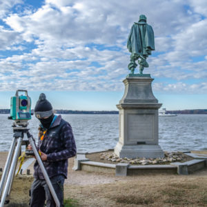 Archaeologist Anna Shackelford prepares to survey some of the features of the north Church Tower excavations.