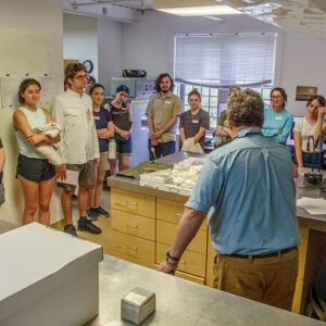 Dr. Chris Wilkins introduces himself and explains his duties to the field school students.