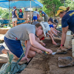 A row of kids trowels at the cellar site.
