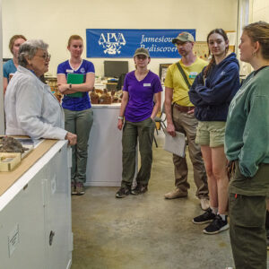 Senior Curator Merry Outlaw gives a tour of the Vault to the Field School students.