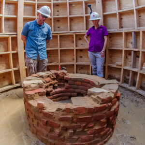 Senior Staff Archaeologists Sean Romo and Mary Anna Hartley discuss the Governor's Well excavations.