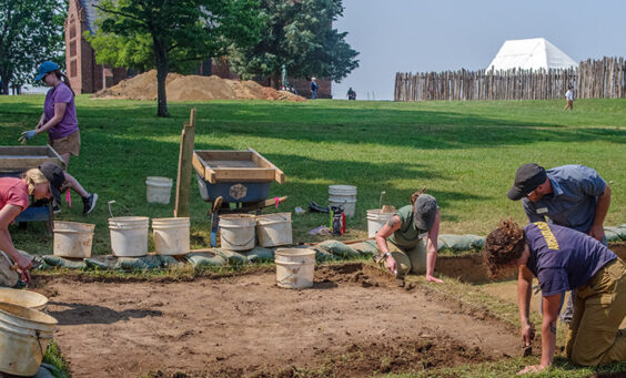 Archaeologists and Field School students digging at the clay borrow pit excavations.