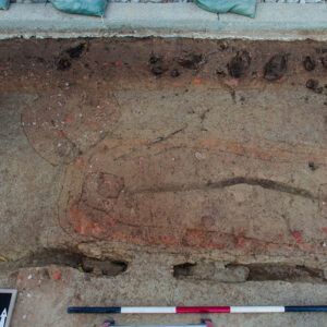 The footprint of the brick-lined burial just south of the Archaearium