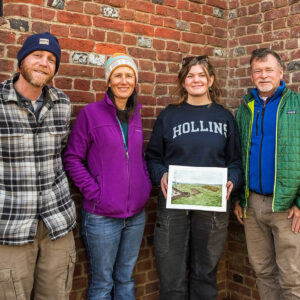 2023 Field School student Eleanor Robb visited the staff in December and shared her painting of the 1608 fort extension construction. Pictured are Senior Staff Archaeologists Sean Romo and Mary Anna Hartley, Eleanor Robb, and Director of Archaeology David Givens