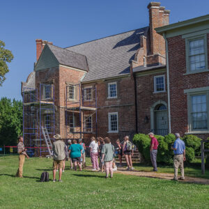 Preservation Virginia's Director of Architecture Eric Litchford gives a tour of Bacon's Castle to field school students and staff.