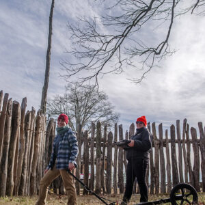 Staff Archaeologist Natalie Reid and Archaeological Field Technician Hannah Barch conduct a GPR survey of the area just west of James Fort's north bulwark.