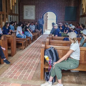 Field school students and staff introduce themselves in the Memorial Church.