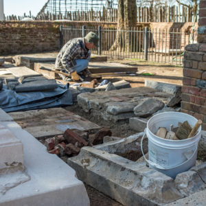 Conservator working in churchyard