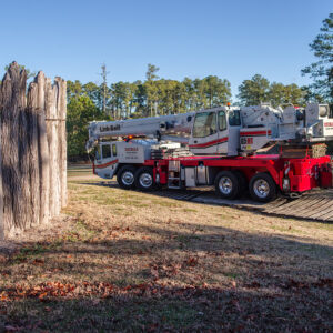 The crane used to lift the Church Tower's roof infrastructure drove over heavy duty pallets to avoid damaging the underground archaeological resources.