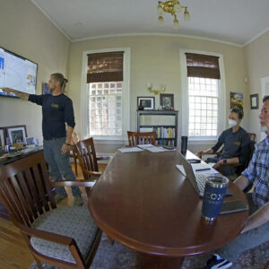 Archaeologists Gabriel Brown, Anna Shackelford, and David Givens design the well ring.