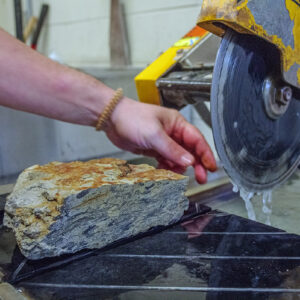 A cross section of one of the stones found in the Governor's Well after being cut by Dr. Chuck Bailey, professor of geology at William & Mary.