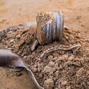 The delft drug jar and lead shot gang mold waste just excavated from the excavation tent next to the ticketing tent.