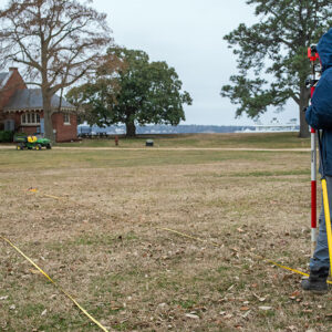 Members of the archaeology team survey the 5'x5' squares marking where the Smithfield excavations will be conducted this season.