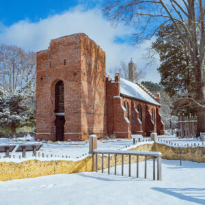 The 1608 church (foreground), 1680s Church Tower, and Memorial Church on a snowy day in January.