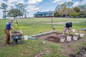 Staff Archaeologists Caitlin Delmas and Gabriel Brown continue excavations at the possible barracks site during a rare dry spell.