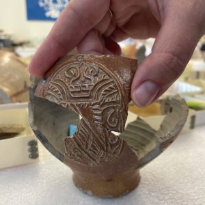 Recently excavated sherd from midden layer in the Seawall area, mending to Bartmann jug with a pseudo-crest