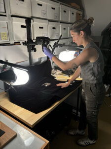 Conservation Intern Amanda Arcidiacono photographs one of the window leads that she conserved during her work at Jamestown.