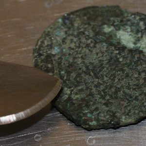 Corroded coin