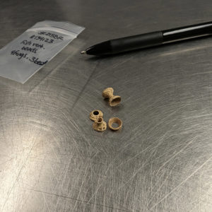 Fish vertebrae that have been altered to create beads. These were found in the fort's second well.