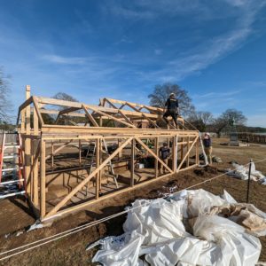 Archaeologists carefully dismantle the burial structure at the 1607 burial ground. They will use it again in later excavations.