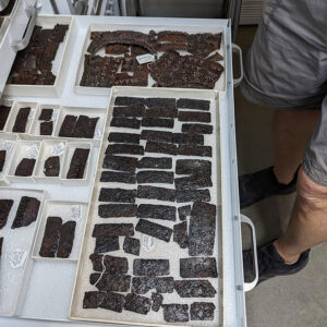 A tray of brigandine armor pieces in the dry room