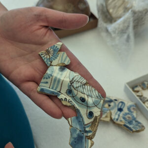 The newly-mended section of the Portuguese faience dish