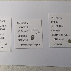 The three types of spangles in the Jamestown collection. Associate Curator Janene Johnston is organizing, cataloging, and conducting pXRF scans of each of the spangles to determine their elemental makeup.