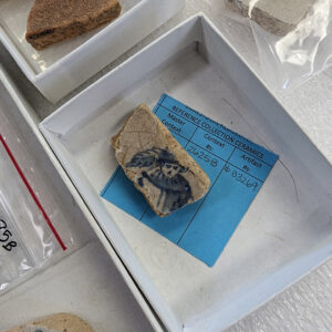 A delft tile sherd bearing the likeness of a soldier