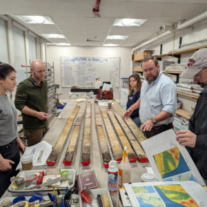 Associate Curator Emma Derry, Director of Archaeology Sean Romo, University of Connecticut's Cassie Aimetti and Dr. David Leslie, and Director of Collections and Conservation Michael Lavin examine the latest batch of vibracore samples from Jamestown.