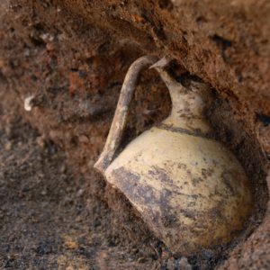 Earthenware costrel in situ