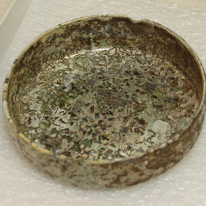 Circular shallow glass vessel